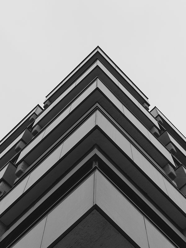 low-angle-shot-grey-concrete-building-representing-modern-architecture